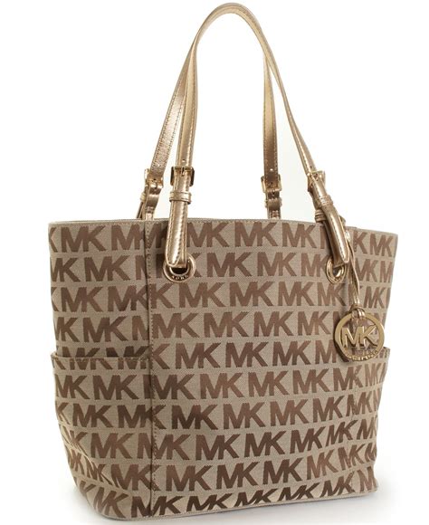 michael kors purse 1309|Michael Kors signature tote strap.